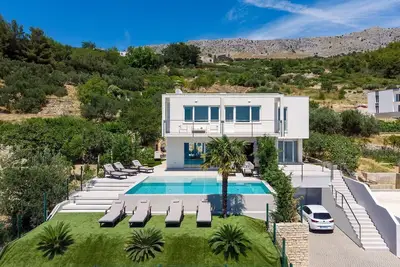 Image de New! Seaview Villa Aba with 38sqm heated infinity pool, 4 bedrooms, Media room, 150m from sea