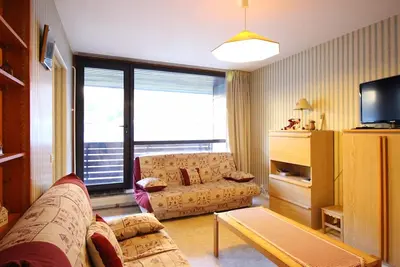 Image de Duplex central 90m² avec parking, 2 chambres, 6 couchages, proche Thermes, wifi inclus