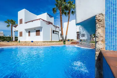Image de Appartement La Perla de Cala d'Or 3 avec piscine partagée, jardin et Wi-Fi