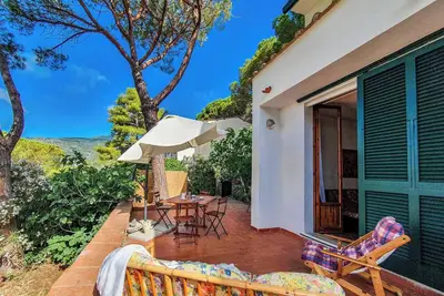 Image de Appartement \"Trilocale La Pineta\" adapté aux animaux domestiques, avec jardin et Wi-Fi.
