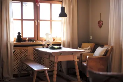 Image de Cozy 2-room apartment in modern country house style with balcony and mountain view