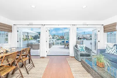 Image de Premium Bayfront Beauty! | Chic Coastal Interior | Oversized Patio w/ Fire Pit | A True Standout!