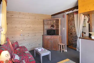 Image de Appartement cosy avec accès pistes, casier à skis et parking souterrain