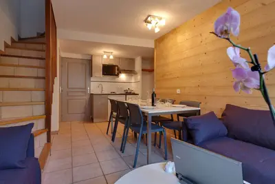 Image de Chalet mitoyen triplex avec terrasse, wifi gratuit et navette vers les pistes