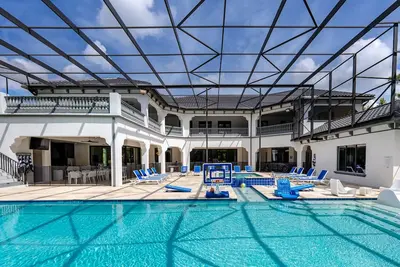 Image de The One at Reunion, Arcades, 200″ Theater, Gym & Sunny South-Facing Private Pool