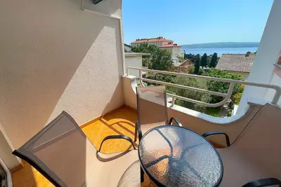 Image de Appartement de vacances avec balcon et vue sur la mer