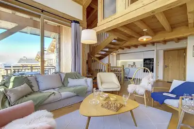 Image de Chalet Cachette · Accès direct aux pistes · Wifi gratuit · Parking couvert · Confort moderne