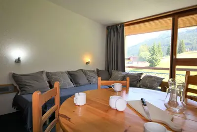 Image de Studio agréable au centre station avec balcon et Wifi gratuit