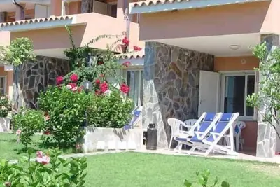 Image de Appartement de vacances Villasimius pour 1 - 5 personnes avec 1 chambre Ă coucher - Maison mitoyenne