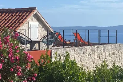 Image de Maison de vacances Podgora pour 1 - 6 personnes avec 3 chambres à coucher - Maison de vacances