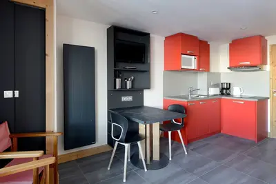 Image de Studio rénové avec parking gratuit, retour ski aux pieds