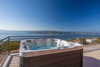 Image de Appartement de vacances avec vue et jacuzzi