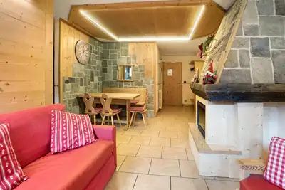 Image de Appartement de vacances 'Baita Dei Ski App 1' près des pistes avec terrasse et Wi-Fi.