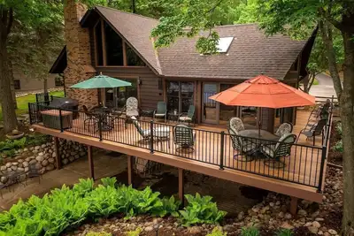 Image de Whitefish Chain Lake Home with Beach + Sauna + King Beds + Kayaks +Paddle Boards