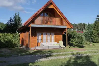Image de Idyllic wooden house with terrace for 5 pers. - Through the forest to the beach