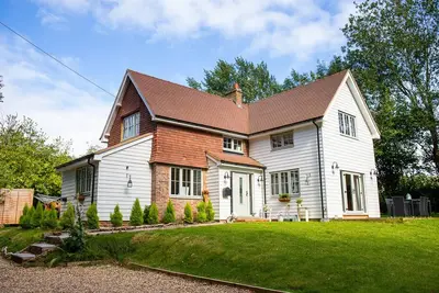 Image de 5br-10Guests-Fireplace-HotTub-Pets ok - Parking