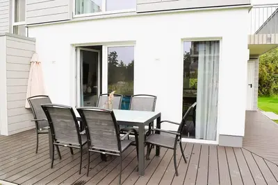 Image de Modern vacation home, sauna, south-facing terrace, loggia with sea view, pets - New