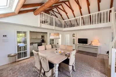 Image de Modern vacation home in a unique location directly on the dike, half of the house