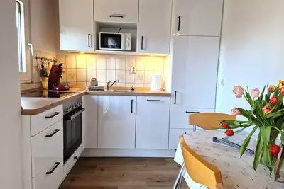 Image de Bungalow in a prime location in Norddeich, approx. 100 m from the sandy beach