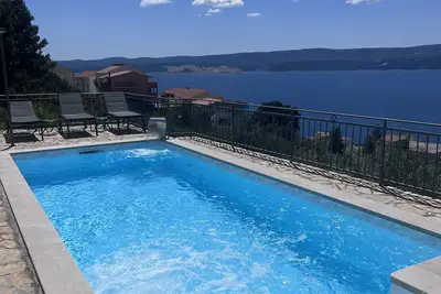 Image de Jolie maison individuelle de 3 chambres double avec vue Mer et piscine chauffée