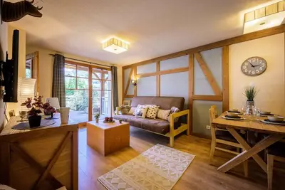Image de Appartement centre-ville avec piscine  et sauna