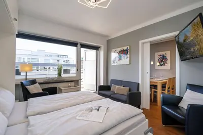 Image de Strandgeflüster - Cozy apartment close to the beach with west-facing balcony, car
