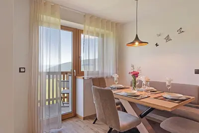 Image de Appartement \"Morgentau\" avec vue sur les montagnes, balcons et Wi-Fi