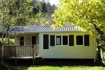 Image de Mobilheim Pacific Standard 24m2 - 2 Schlafzimmer + halb überdachte Terrasse 10m2 + Tv (Sonntag) 4 Personen
