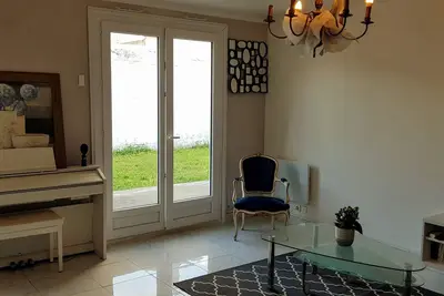 Image de Maison avec jardin et parking 15 minutes des champs Elysées