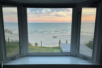 Image de Direct beachfront home with stairs to private beach!