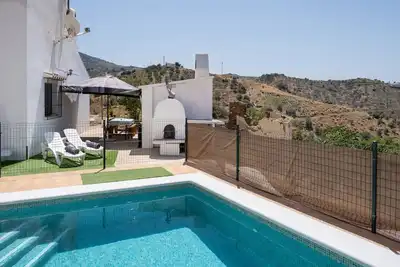 Image de Maison de vacances Casita T avec vue sur les montagnes, piscine et Wi-Fi.