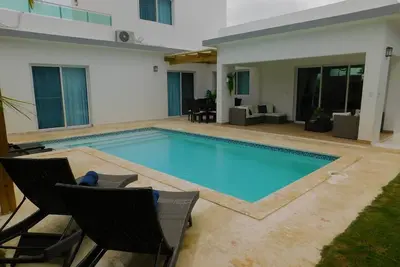 Guest-friendly villa with  pool in beachfront resort with gym and waterpark