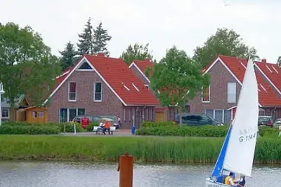 Image de Ferienhaus Wattje Am Yachthafen 102 E