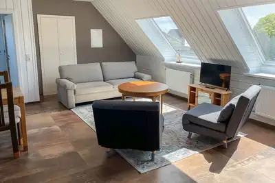 Image de Cozy, completely renovated, light-flooded vacation apartment with a great view of the mountains.