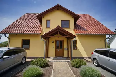 Image de Balcony with sea view, free swimming pool and sauna - Haus De niege Wech FeWo 04 -
