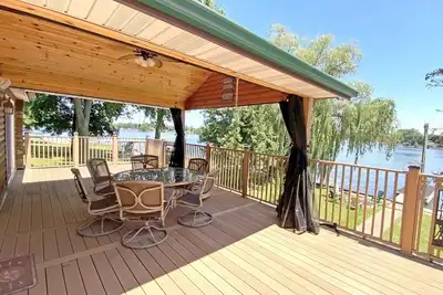 Image de Secluded Sw Michigan Lake View Log Cabin w\/ Fire Pit & Deck on Long Lake