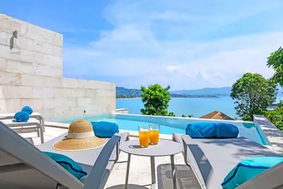 Image de Beachside 3 Bdr Villa + 1 Bdr Apartment with Sunset & Sea Views, 100m to Water
