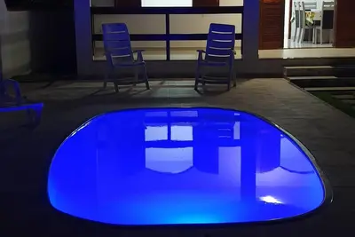 Image de Beautiful beach house with pool and barbecue area