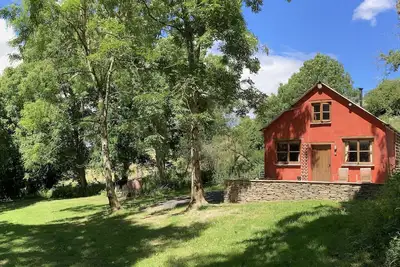Image de The Red Shed - A cosy woodland cabin with woodburner