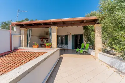 Image de Maison de vacances Casa Vacanza Nilde près de la plage avec vue sur la mer et jardin.