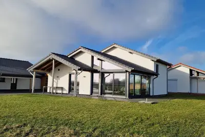Image de Maison de vacances Butjadingen pour 1 - 8 personnes avec 4 chambres à coucher - Maison de vacances