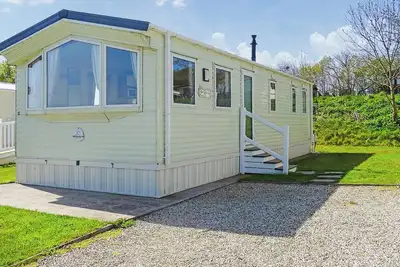 Image de 3 chambres à coucher à Nr St Austell