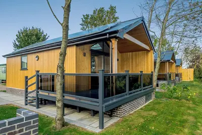 Image de Stunning lodge with one king-size double and en suite shower.