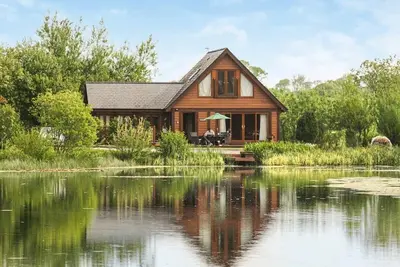 Perfectly positioned with panoramic views of the lake.