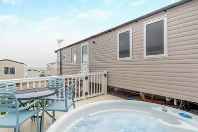 Super 12ft-wide luxurious caravan with one double and two twin.