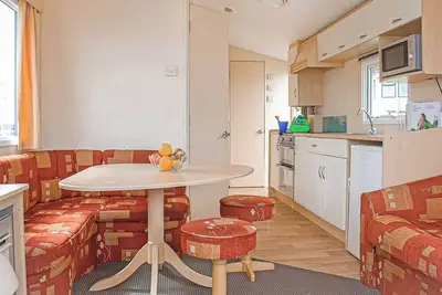 Image de Comfortable family caravan with one double and one twin.