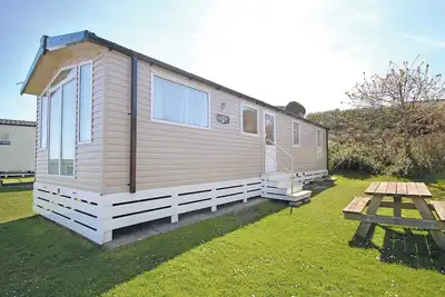 Image de 3 chambres à coucher à Swanage