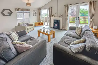 Image de Luxury lodge with one double with en suite shower and one twin.