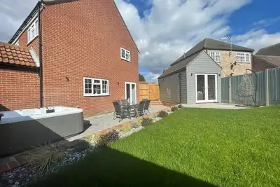 Image de Luxurious 5 Bedroom Home from Home With HotTub!