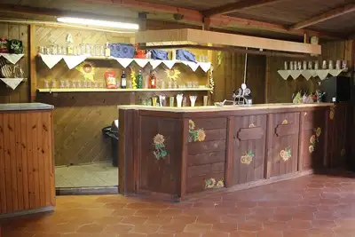 Image de Bungalow in contesto naturalistico a 800 mt da spiaggia libera.